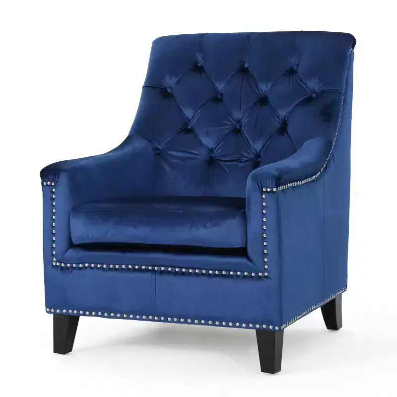 Fauteuil club capitonné en velours